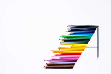 Letter A made of colored pencils isolated on white background. School banner mockup design. Creative...
