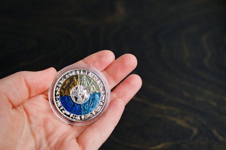 The first World 4 Color Titanium Bi-Metal coin. reverse side. Greek gods: Demeter - Earth - brown,...