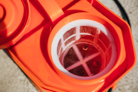 Sprayer tank with mesh filter close-up. garden spray equipment. Container for a mixing water with...