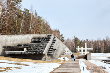 Khatyn, Belarus - March 13, 2021 State memorial complex. The burned villages. Victims of the Second World War. Symbol of the mass destruction of civilians by the Nazis. Visitors. Spring season. March.のeditorial素材