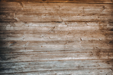 Brown wooden background. Wood texture. It's an aged logs wall. Rustic style. Weathered board. Striped banner. Natural material.の写真素材