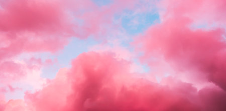 Fairytale sky with sugar cotton pink clouds in a dreamy background. Fantasy environment. Amazing...