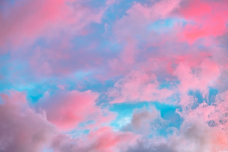 Fairytale sky with sugar cotton pink clouds in a dreamy background. Fantasy environment. Amazing...