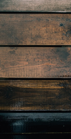 Wooden boards painted with different numbers of layers of wood oil dark brown color. Old rustic texture. Oiled planks. Natural material. Background for banner backdrop 3D mappingの写真素材