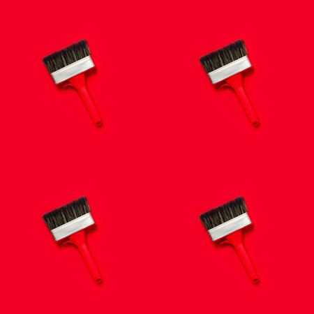 Seamless pattern with large wide new red brush for construction or wall painting or canvas priming...