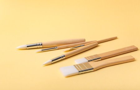 Collection of new paintbrushes of various sizes and styles for painting, crafting, art projects, and...