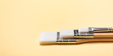 Collection of new flat paintbrushes of various sizes for painting, crafting, art projects, and detailed hobby work. Tools of artist. New brush set. Drawing tassel variety. Highの写真素材