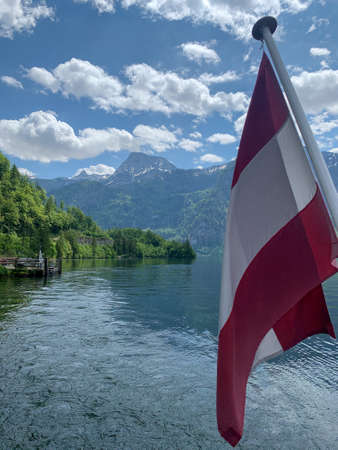 Austrian flag in Upper Austria region, Hallstatt, Austrian Alps, Austriaの写真素材
