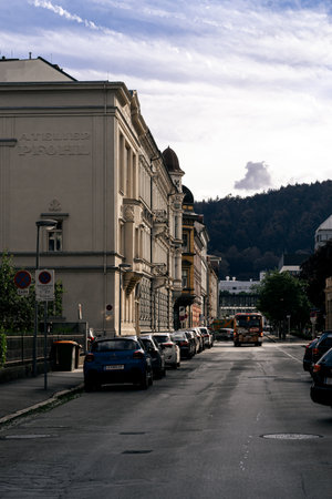 Leoben, Styria, Austria - 07/14/2024: View of a small city street in the Austrian Alps.