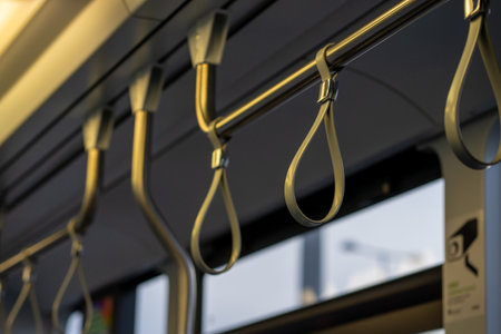 View of the upper handrail loops in public transport.