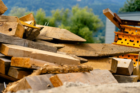 Various building materials and fixtures near a house under construction.