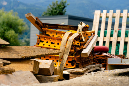 Various building materials and fixtures near a house under construction.の写真素材