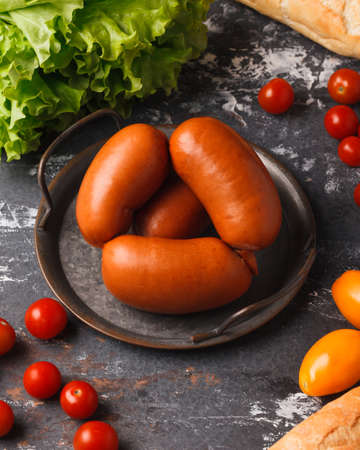 Meat and sausage delicacies. Cold cut. Sausage, bacon, carpaccio, knuckle.の写真素材