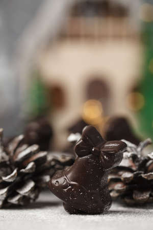 Christmas chocolates. Chocolate figurines-Santa Claus, hare, horse, dragon, bellの写真素材