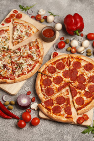 Italian pizza. Classic round pizza. Pizza and slices. Pizza on bright backgrounds with ingredients.の写真素材
