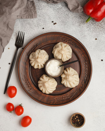 Prepared semi-finished products. Dumplings, khinkali, manti. New year's atmosphereの写真素材