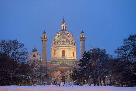 Vienna, Austria - 20 January, 2013: St. Petersburg Petersburg Charles Church in Vienna. Peaceful evening after strong snowfall makes the church look more pacified as usual.のeditorial素材