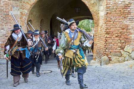 Brno, Czech Republic - August 18, 2018: Historical reenactment Day of Brno. Infantrymen in historical costumes go out through the gates of the Spielberg castleのeditorial素材