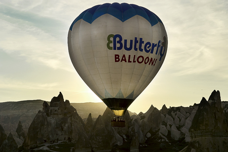 Cappadocia, Turkey - May 02, 2013: Colorful hot air balloons flying over the valley at Cappadocia. Hot air balloons are traditional touristic attraction in Cappadocia.のeditorial素材
