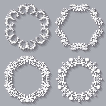 Set of four circular carved varied frames on grey background with long shadows for your design. Lacy and delicate ornament.のイラスト素材