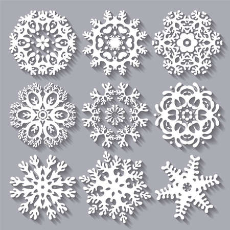 Snowflakes flat icon set collection. Set of nine carved varied snowflakes with long shadows.のイラスト素材