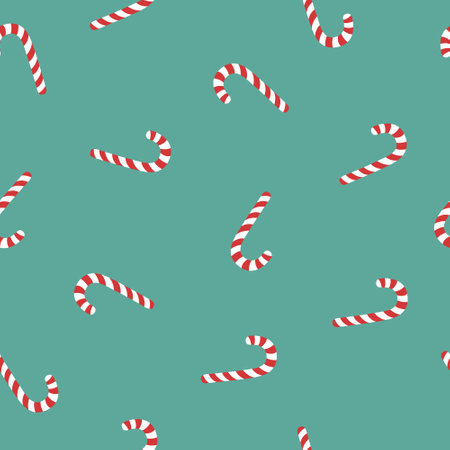 Christmas striped candies on green background. Christmas pattern with candies.のイラスト素材