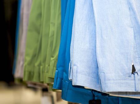 Set of colored pants in the store.の写真素材