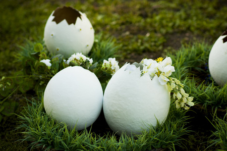 big  decorated eggs with flowers in a basket