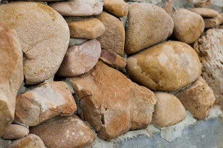 shapeless stones wall. Texture, background.