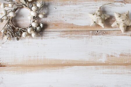 Flat lay Christmas decoration on wooden boards with free space for text.の写真素材