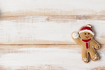Flat lay xmas gingerbread man  on wooden boards.の写真素材