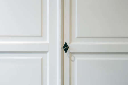White closet doors wood closeup modern designの写真素材
