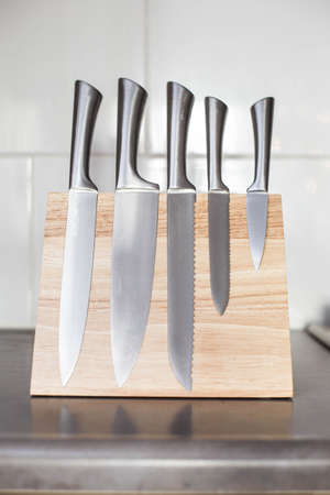knives with magnet wood block on the kitchen counter, modern design