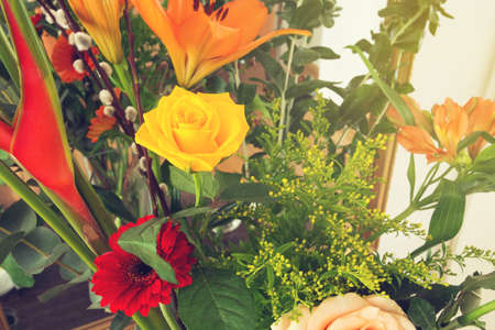 Bright bouquet of different flowers, colorful spring theme