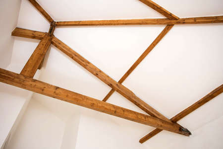 Wooden design. Wooden beams to ceiling as a design element. Modern interior.の写真素材