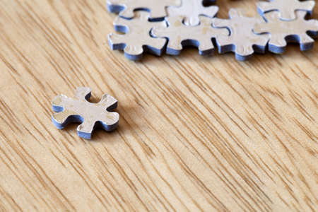 Blank puzzle pieces on wooden background texture, business and connection concept. space for text....