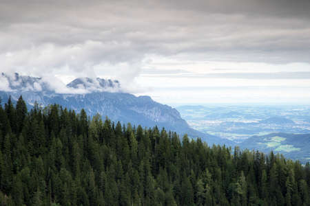 Majestic view on beautiful fog mountains in mist landscape. Dramatic Travel background.の写真素材