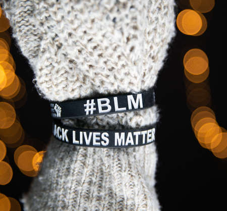 Black lives Matter movement wristband bracelets, sayitbands in black and white, background concept for antiracismの写真素材