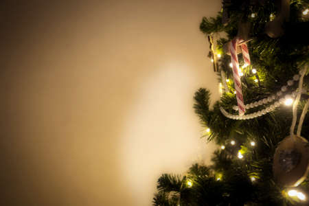 christmas tree detail with christmas decoration sparkling lights and glitter, copy space background Christmasの写真素材
