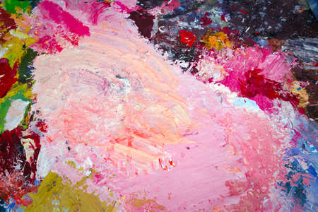 Various colors of paint, multi colored abstract oil paint stains background, bright colors painting...