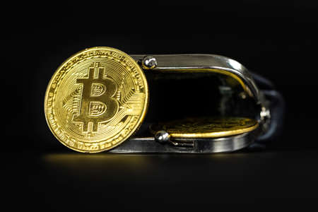 Crypto currency coin in leather wallet on black background bitcoin ethereum litecoin, Technology,save,business and financial conceptの写真素材