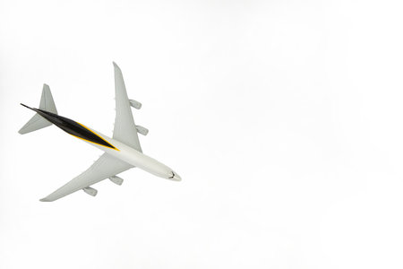 Flying commercial passenger jet plane Take off airplane. Isolated on white background and copy spaceの写真素材