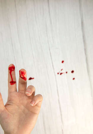 hand injury with blood, blood wound cut top view, copy space, medical concept needs stitchesの写真素材