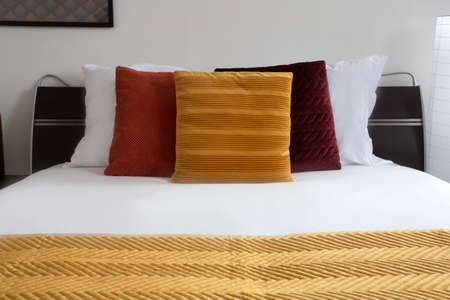 made bed. Modern and Neat Bed at Night. Elegant double bed. close-up of a made-up bedroom in a hotel...