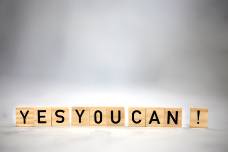 Yes you can text wooden cubes . Positive thinking, motivation, attitude and confidence concept. bright background texture with copy space self believeの写真素材