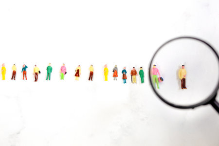 Searching employee or leader. Staff recruiting. Headhunting. Many employees and the choice of a leader from the crowd. HR. business and Human resource management concept figure stand out from the crowd successful choice top viewの写真素材