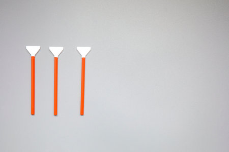 Sensor cleaning kit, Layout of cleaning kit for digital cameras, cleaning sensor with small brush and airbomb. Copy space for text in the middle top viewの写真素材