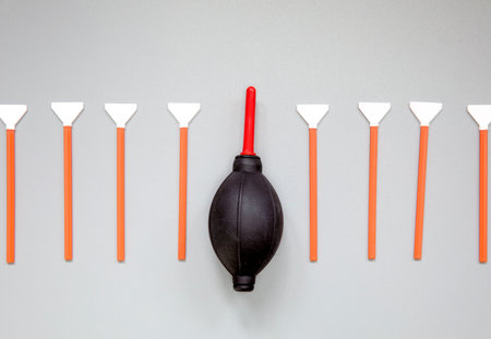 Sensor cleaning kit, Layout of cleaning kit for digital cameras, cleaning sensor with small brush and airbomb. Copy space for text in the middle top viewの写真素材