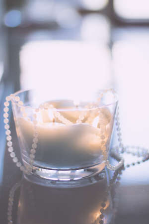Beautiful holiday candle lights, romantic home decorationの写真素材