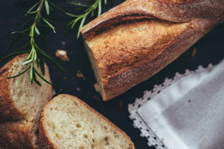 homemade food and pastry styled concept - rustic whole wheat bread recipeの写真素材